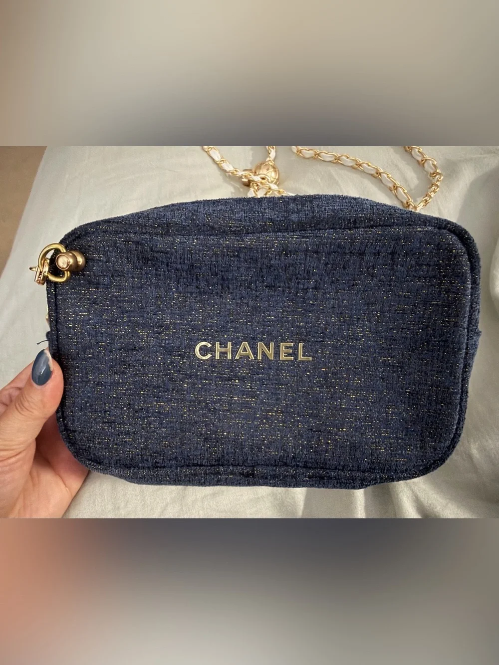 Authentic Chanel Beaute denim cosmetic pouch with white/gold standard chain